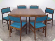Rectangular dining table and 6 chairs seat and back upholstered in blue