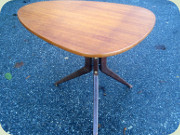 Swedish 50's organic
                          shaped three legged teak coffee table by
                          Möbelbolaget Tranås model 775