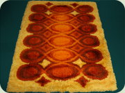 60's rug in orange,
                          brown and yellow