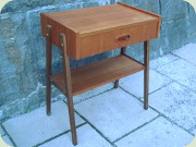 Swedish 60's teak
                          bedside table with drawer and magazine shelf