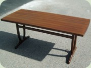 Teak coffee table with
                          walnut legs