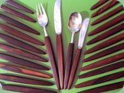 60's rosewood &
stainless steel cutlery marked Märtha Norway