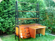 Swedish 60's teak
                          bookshelf with cabinet and drawers, black
                          lacquered A-shaped sides