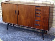 Scandinavian 60's
                          rosewood sideboard with 6 drawers, black
                          handles and legs