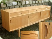 Scandinavian 60's or
                          70's light oak long sideboard with 3 drawers
                          and sliding doors