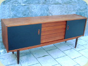 Troeds Trio
                          Swedish50's or 60's teak sideboard with 5
                          drawers andblack lacquered sliding doors,
                          designed byNils Jonsson