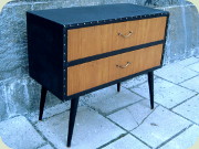 Swedish 50's small
                          chest of drawers dressed in black vinyl