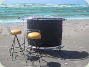 60's black vinyl &
                          chrome bar with 2 bar stools in black
                          lacquered metal and upholstery in yellow
                          vinyl