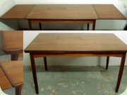 Scandinavian 50's or
                          60's teak evtending dining table