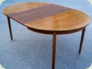 Round teak dining
                          table with leaf