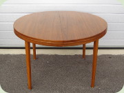 Swedish 60's walnut
                          round dining table with 2 leaves, Skaraborgs
                          Möbelindustri Tibro