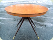 Swedish 50's round
                          teak table´on split pedestal base