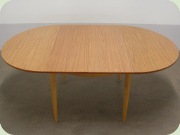 60's round dining table with 2 leaves, wood imitating laminate