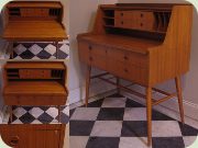 Swedish 50's teak
                          writing desk with magazine shelf