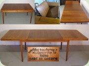 Swedish 60's walnut
                          dining table with folded extension leaf by
                          Skaraborgs Möbelindustri Tibro