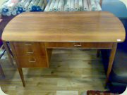 Mahogany desk with
                          brass handles