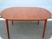 Large, oval teak
                          dining table with leaves, Swedish 60's design
                          by Nils Jonsson, Troeds Bjärnum