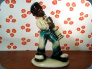 Chalkware figurine,
                          musician