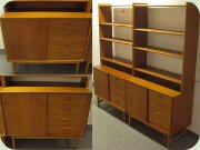 Bokhylla i teak, 4
sektioner med skjutdörrar och lådor, 50-tal