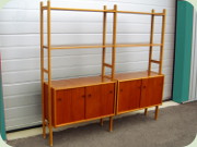 Swedish 50's teak and
                          oak bookcase with sliding doors