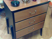 50s chest of drawers
                          with brass handles, teak with black sides,
                          Gyllensvaans Möbler, Sweden