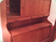 Teak
                          highboard with sliding door and bar cabinet