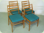Set of four 50's or
                          60's beech dining chairs