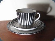 Zebra tea cup with
                          saucer and small plate, Eugén Trost, Gefle
                          Upsala Ekeby